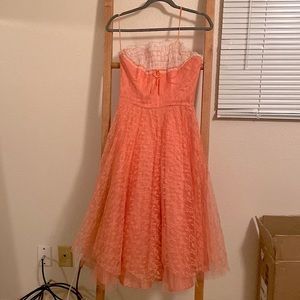Unique extra small peach lace dress with zip up back. Purchased at antique shop.